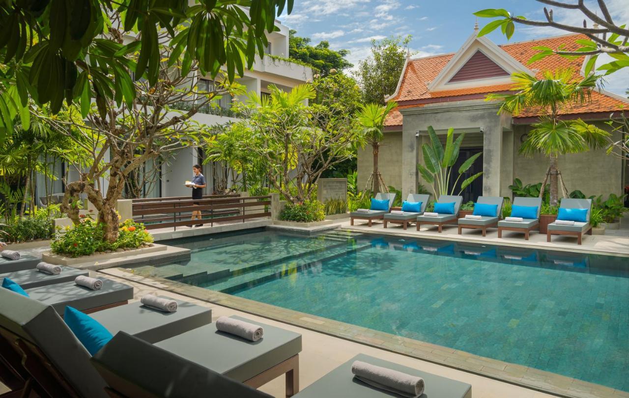 Eightfold Urban Resort เสียมราฐ ภายนอก รูปภาพ The swimming pool at The Library