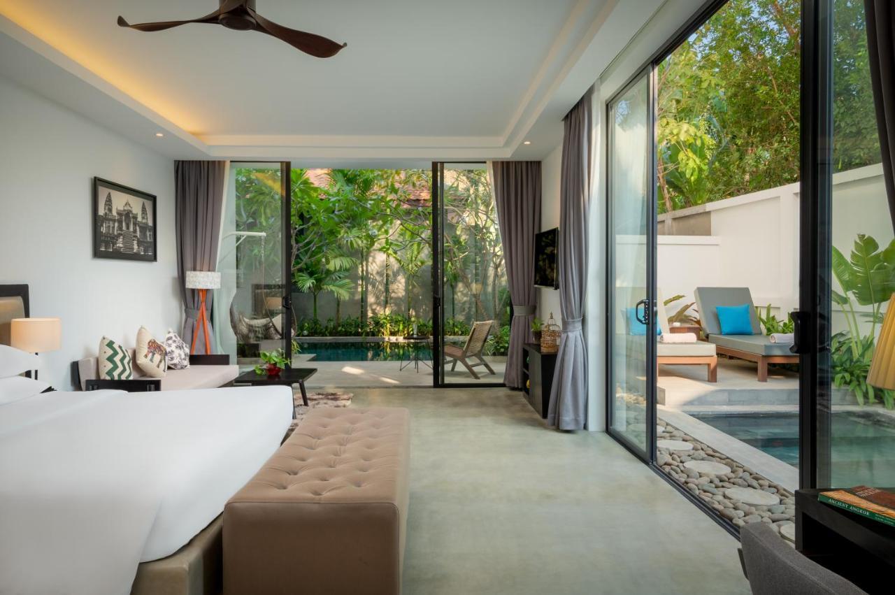 Eightfold Urban Resort เสียมราฐ ภายนอก รูปภาพ A pool villa at The Village Phuket