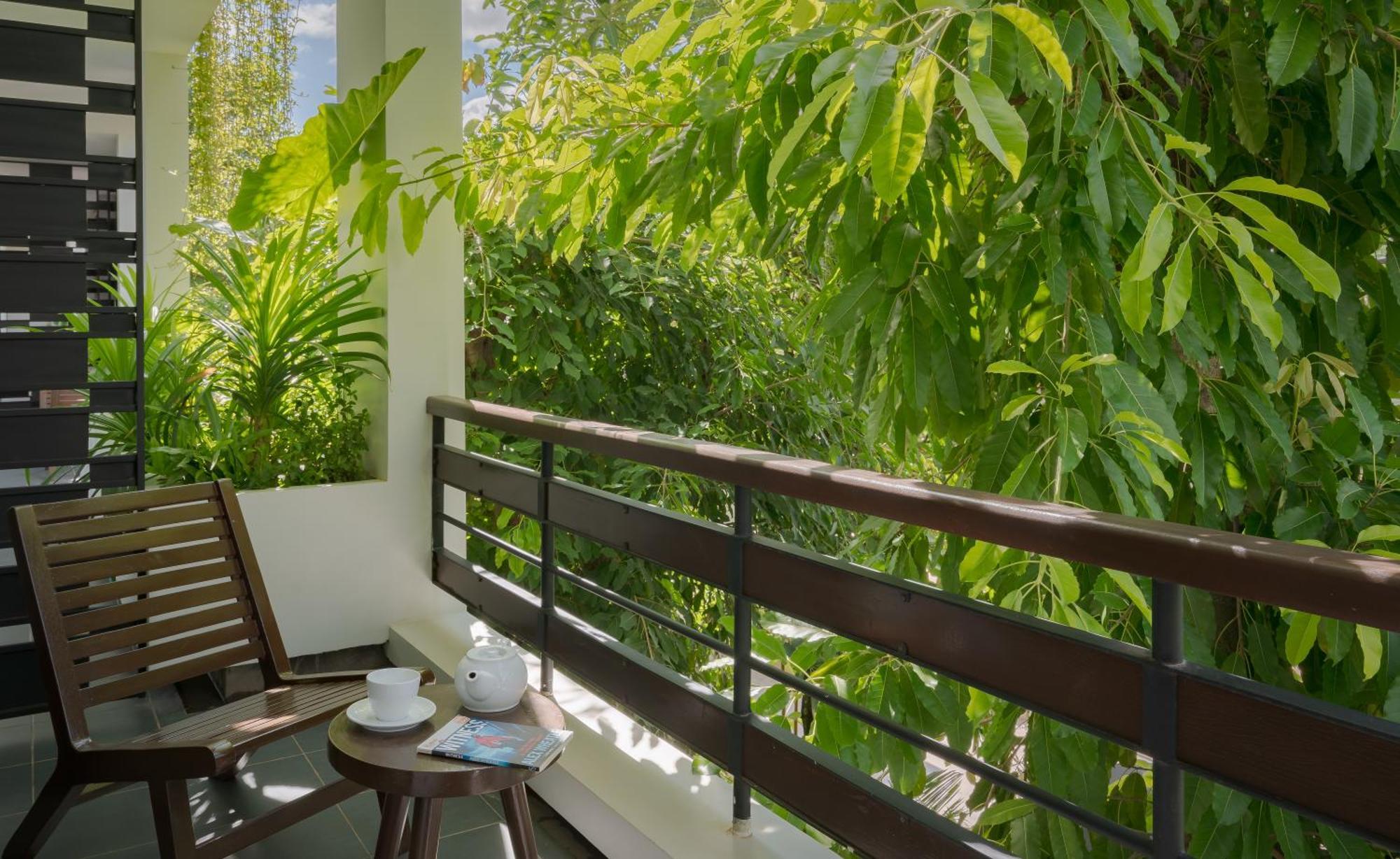 Eightfold Urban Resort เสียมราฐ ห้อง รูปภาพ A balcony