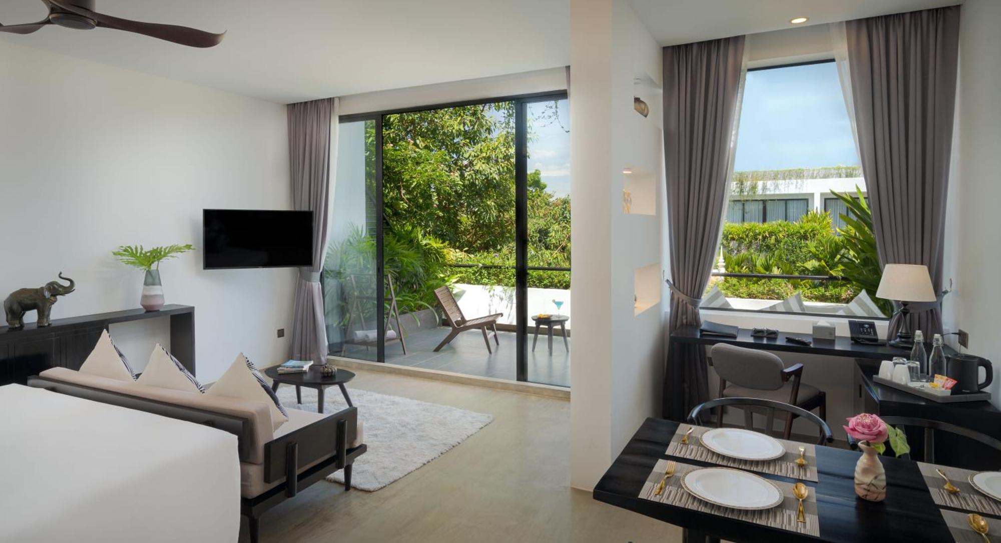 Eightfold Urban Resort เสียมราฐ ภายนอก รูปภาพ A living room at the hotel